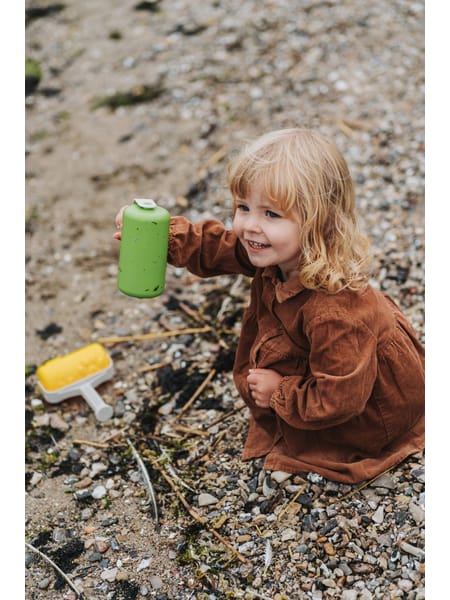 Tre mønsterruller i farverne grøn, gul og blå med metalskafter